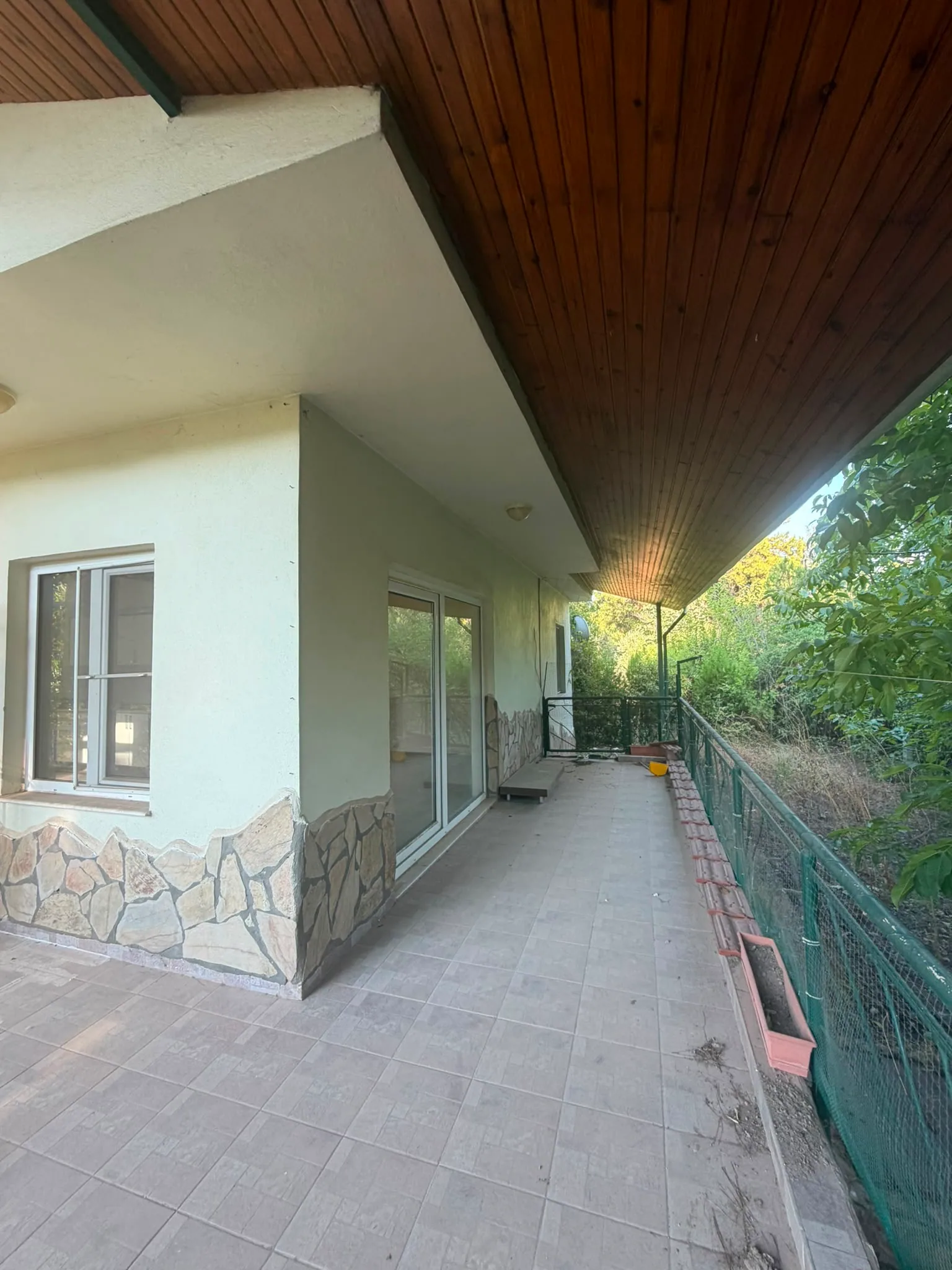 Existing condition before renovation: a second view along the terrace